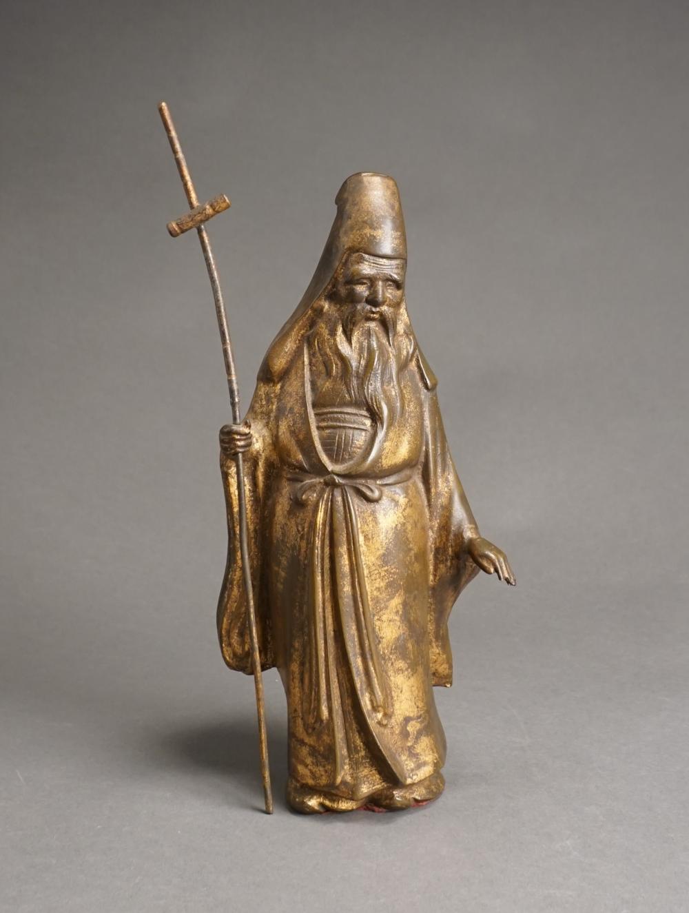 CHINESE BRONZE FIGURE OF A TRAVELING 2e6079