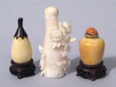 Two ivory snuff bottles and a white 4a373
