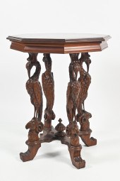 STORK/RAM CARVED LAMP TABLE: This Victorian