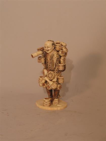 Japanese Carved Figure of Pot Seller 4b10a