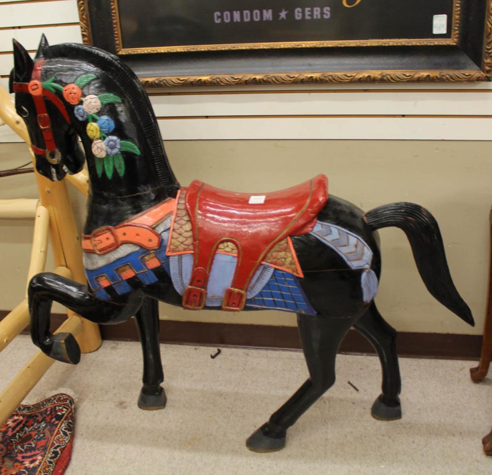 A CARVED AND PAINTED WOOD CAROUSEL  2edb5c