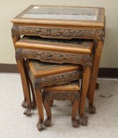 FOUR-PIECE CARVED TEAK NESTING TABLE