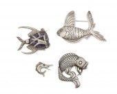 A GROUP OF MEXICAN SILVER FISH BROOCHESA