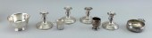 FOUR MATCHING STERLING SILVER LOW CANDLESTICKS
