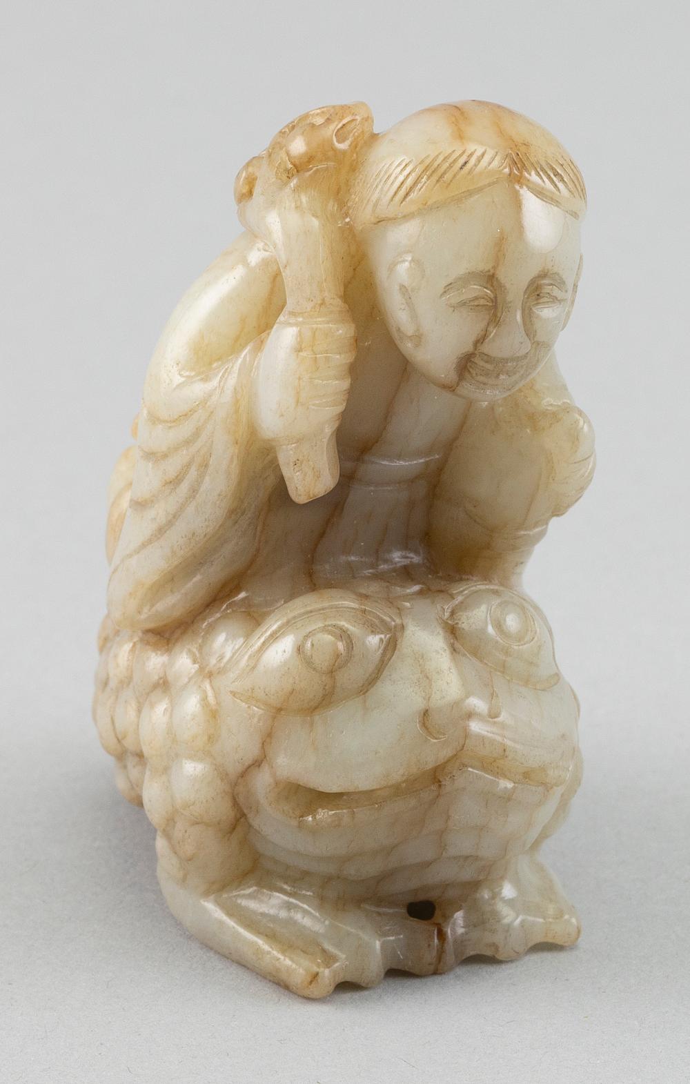 CHINESE CARVED MUTTONFAT JADE FIGURE