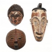 THREE WEST AFRICAN CARVED AND PAINTED 2f0185
