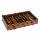 A CASED SET OF (13) WRITING INSTRUMENTS