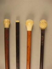 Group of four ivory mounted walking