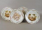 Four Lille soft paste porcelain plates