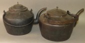 2 CAST IRON TEA KETTLESca. 1820-1830;