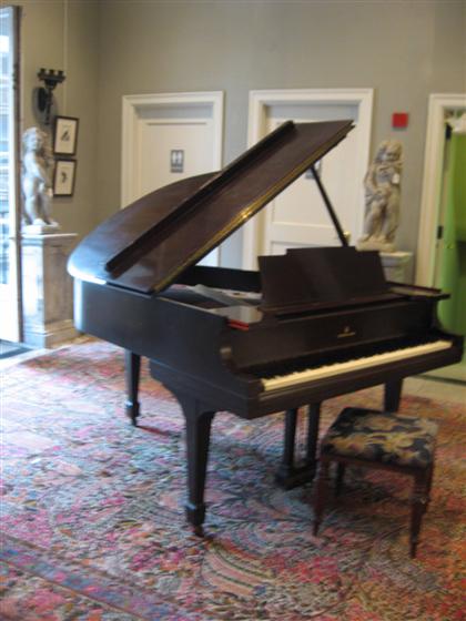 Steinway mahogany baby grand piano