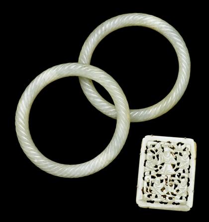 Two Chinese white jade bangles and jade plaque