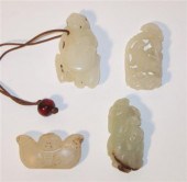Four Chinese white jade pendants   