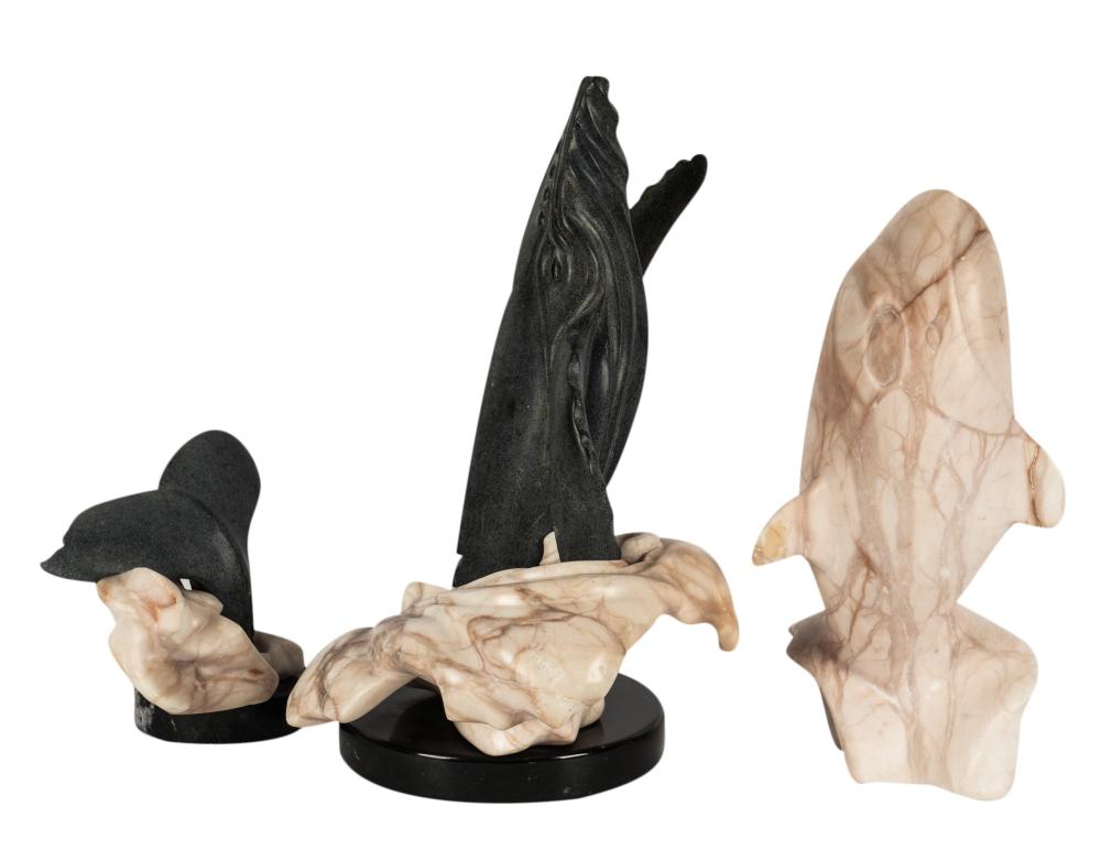 THREE CARVED STONE WHALE SCULPTURESThree 3051a5