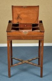 A petite ca. 1800 mahogany writing desk