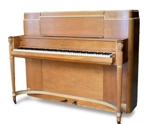 A vintage Steinway Sons upright 305cde
