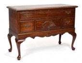 A vintage Queen Anne style cedar chest,
