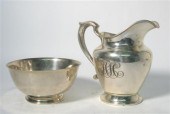 Sterling silver water pitcher andRevere