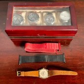 An assembled lot of five wrist watches,