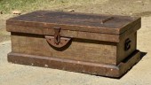 An antique wood tool chest, with an