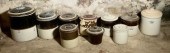 Ten vintage lidded stoneware crocks 306907