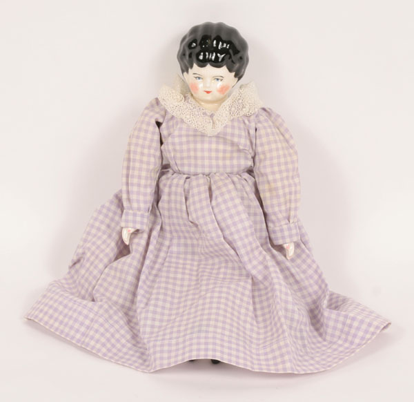 Nineteenth century molded china head doll