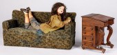 ANIMATED DOLL ON A COUCH STORE DISPLAYAnimated
