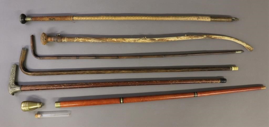 Five walking sticks and canes  311069