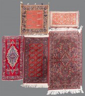 FOUR SMALL ORIENTAL RUGS INCLUDING TWO