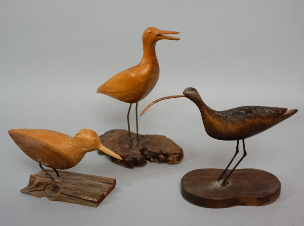 THREE CARVED WATER BIRDS ON NATURALISTIC 312e80
