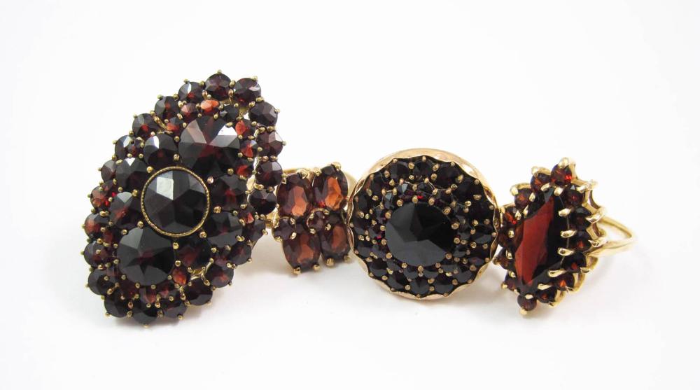 COLLECTION OF FOUR GARNET AND YELLOW 3161f7