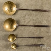 FOUR WROUGHT IRON AND BRASS LADLES,