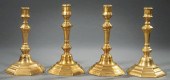 TWO PAIRS OF FRENCH BRASS CANDLESTICKSTwo 31a94b