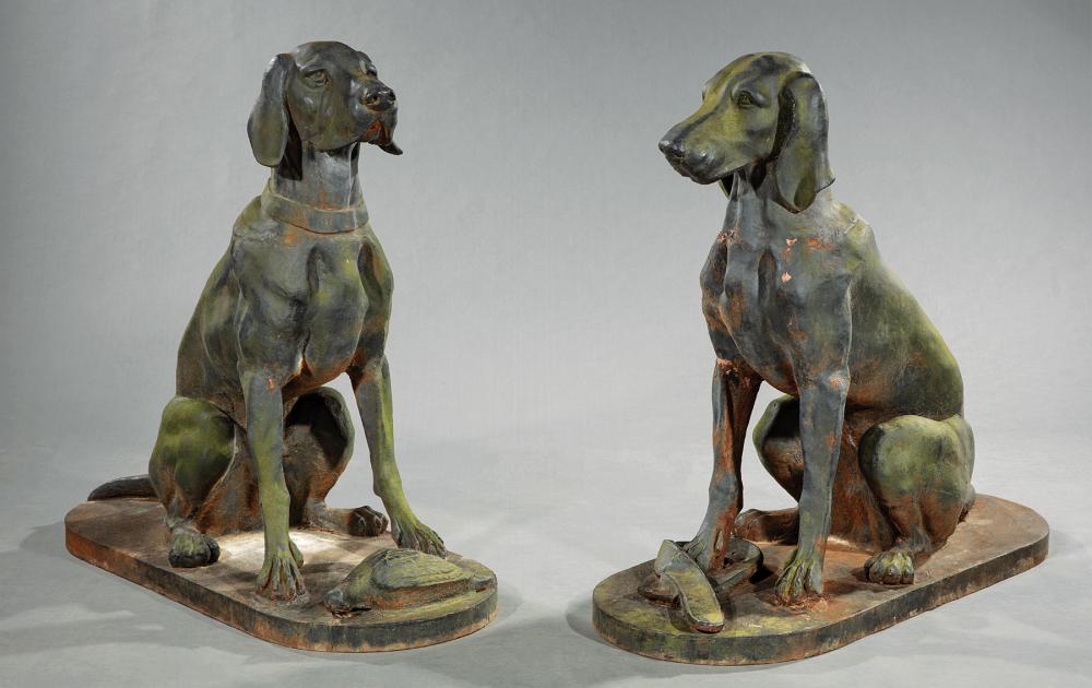 PAIR OF CAST IRON FIGURES OF HUNTING 31ab5b