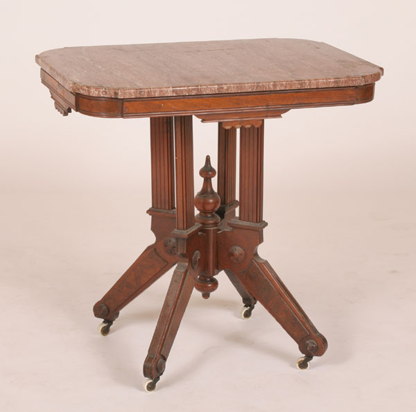 Victorian walnut marble top lamp table; fluted