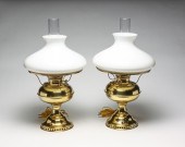 TWO AMERICAN RAYO LAMPS. Circa 1900.