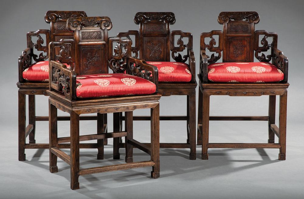 FOUR CHINESE CARVED HARDWOOD ARMCHAIRSFour 31a694