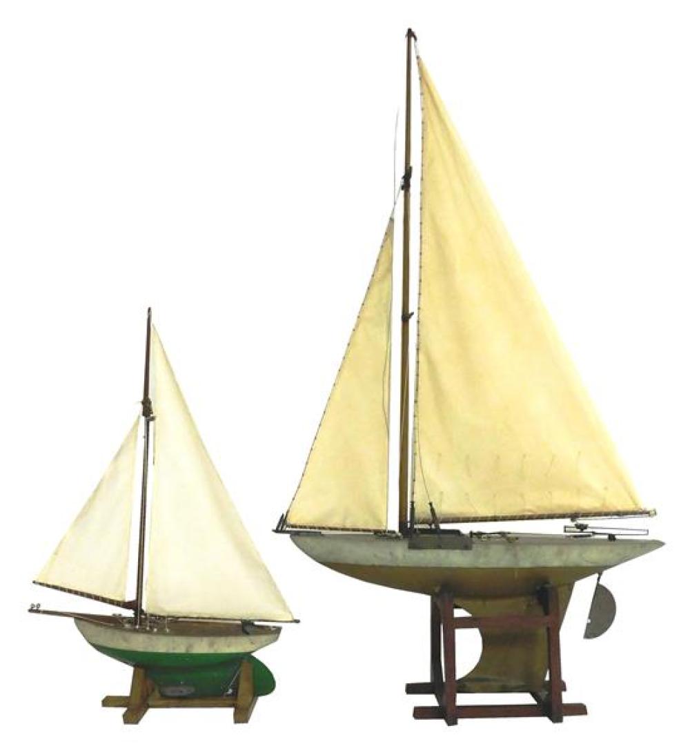 TWO WOODEN POND SAILERS WITH METAL 31d4b7