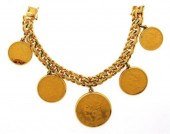 JEWELRY: 14K GOLD COIN BRACELET WITH