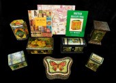 SEVEN BISCUIT TINS WITH THREE BOOKS,
