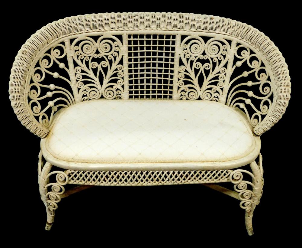 WICKER SETTEE WITH SCROLLWORK AND 31e145