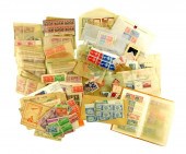 STAMPS: PARTIAL COLLECTION, STUCK INTO