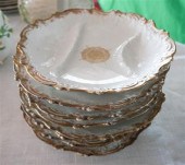 EIGHT LIMOGES OYSTER PLATESEight Limoges