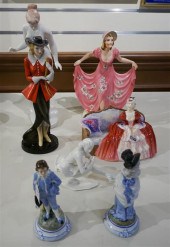 GROUP WITH SEVEN PORCELAIN FIGURINES,