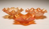 Three carnival glass Marigold bowls,