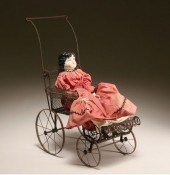Antique China doll on Victorian wire