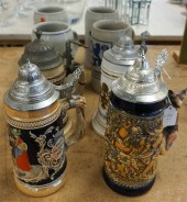 FOUR GERMAN PEWTER MOUNTED STEINS 3234ad