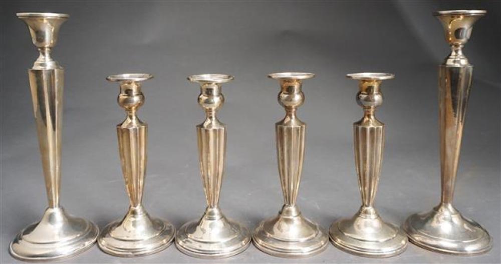 THREE PAIRS WEIGHTED STERLING CANDLESTICKSThree 323c95