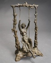 BRONZE SCULPTURE OF LADY ON SWING, AFTER