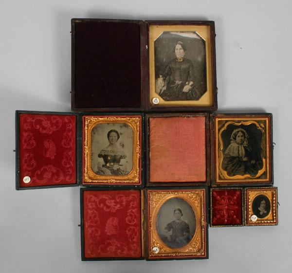 Five Victorian era glass plate photographs;